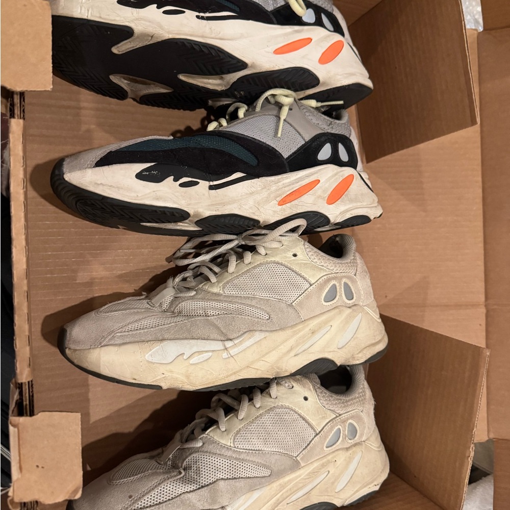 Yeezy Sneakers in Black, Gray, and Cream with Orange Accents